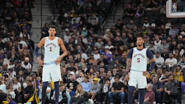 Nov 27, 2024; San Antonio, Texas, USA;  San Antonio Spurs center Victor Wembanyama (1) and guard Stephon Castle (5) in the first half against the Los Angeles Lakers at Frost Bank Center. Mandatory Credit: Daniel Dunn-Imagn Images