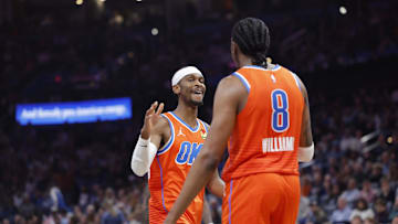 Nov 28, 2025; Oklahoma City, Oklahoma, USA; Oklahoma City Thunder guard Shai Gilgeous-Alexander (2) high fives guard Jalen Williams (8) after scoring against the Phoenix Suns during the second half at Paycom Center. Mandatory Credit: Alonzo Adams-Imagn Images