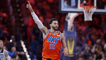 Nov 26, 2025; Oklahoma City, Oklahoma, USA; Oklahoma City Thunder guard Ajay Mitchell (25) gestures to his team during a play against the Minnesota Timberwolves during the second half at Paycom Center. Mandatory Credit: Alonzo Adams-Imagn Images