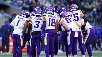 Nov 30, 2025; Seattle, Washington, USA; The Minnesota Vikings huddle up during the second half against the Seattle Seahawks at Lumen Field. Mandatory Credit: Kevin Ng-Imagn Images