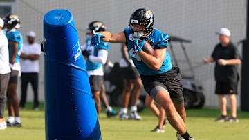 Jacksonville Jaguars tight end Patrick Herbert (47) runs past a pop up dummy during an NFL training camp session at the Miller Electric Center, Friday, July 25, 2025, in Jacksonville, Fla. [Corey Perrine/Florida Times-Union]