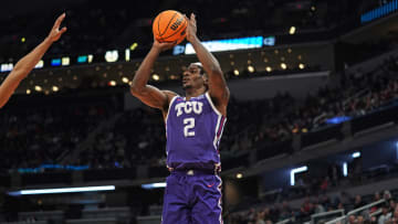 Mar 22, 2024; Indianapolis, IN, USA; TCU Horned Frogs forward Emanuel Miller (2) takes a shot at the basket during the first half against the Utah State Aggies in the first round of the 2024 NCAA Tournament at Gainbridge FieldHouse. Mandatory Credit: Robert Goddin-USA TODAY Sports