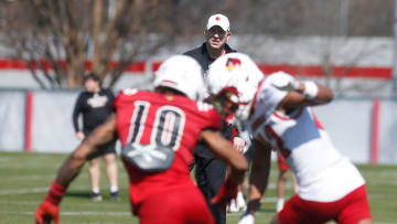 Louisville head coach Jeff Brohm watches spring practice.