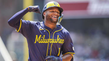 Aug 8, 2024; Cumberland, Georgia, USA; Milwaukee Brewers center fielder Jackson Chourio (11) reacts after hitting a home run against the Atlanta Braves during the fifth inning at Truist Park. Mandatory Credit: Dale Zanine-USA TODAY Sports