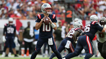 Nov 9, 2025; Tampa, Florida, USA; New England Patriots quarterback Drake Maye (10) throws downfield during the second quarter against the Tampa Bay Buccaneers at Raymond James Stadium. Mandatory Credit: Nathan Ray Seebeck-Imagn Images