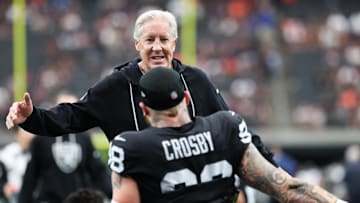 Sep 28, 2025; Paradise, Nevada, USA; Las Vegas Raiders defensive end Maxx Crosby (98) high fives head coach Pete Carroll prior to the game against the Chicago Bears at Allegiant Stadium. Mandatory Credit: Kiyoshi Mio-Imagn Images