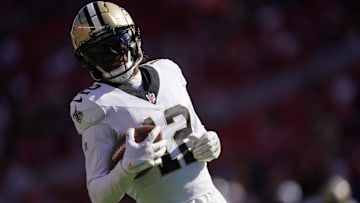 Aug 18, 2024; Santa Clara, California, USA; New Orleans Saints wide receiver Chris Olave (12) runs with the ball before the start of the game against the San Francisco 49ers at Levi's Stadium. Mandatory Credit: Cary Edmondson-Imagn Images