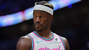 Jan 17, 2025; Miami, Florida, USA; Miami Heat forward Jimmy Butler (22) looks on against the Denver Nuggets during the third quarter at Kaseya Center. Mandatory Credit: Sam Navarro-Imagn Images