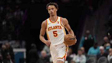 Mar 18, 2025; Charlotte, North Carolina, USA; Atlanta Hawks guard Dyson Daniels (5) brings the ball up court against the Charlotte Hornets during first quarter at Spectrum Center. Mandatory Credit: Jim Dedmon-Imagn Images