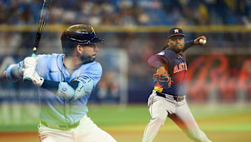 Aug 12, 2024; St. Petersburg, Florida, USA; (editors note: in camera double exposure) Houston Astros pitcher Framber Valdez (59) throws a pitch to Tampa Bay Rays third baseman Jose Caballero (7) in the sixth inning  at Tropicana Field. 