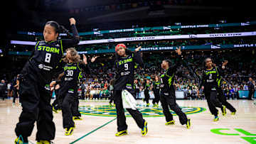 The Seattle Storm Guard Erica Wheeler demonstrates her commitment to community engagement by gifting AE1 sneakers to the Storm Dance Troupe. This act highlights her dedication to supporting local groups and fostering a sense of community through her generosity.
