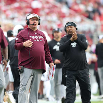 Oct 18, 2025; Fayetteville, Arkansas, USA; Texas A&M Aggies head coach Mike Elko during the first quarter against the Arkansas Razorbacks at Donald W. Reynolds Razorback Stadium. Mandatory Credit: Nelson Chenault-Imagn Images