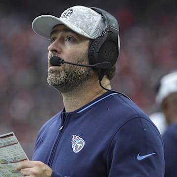 Nov 24, 2024; Houston, Texas, USA; Tennessee Titans head coach Brian Callahan looks up from the sideline during the third quarter against the Houston Texans at NRG Stadium. Mandatory Credit: Troy Taormina-Imagn Images