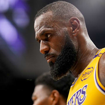 Dec 19, 2024; Sacramento, California, USA; Los Angeles Lakers forward LeBron James (23) walks towards the team bench during a timeout against the Sacramento Kings in the fourth quarter at the Golden 1 Center. Mandatory Credit: Cary Edmondson-Imagn Images