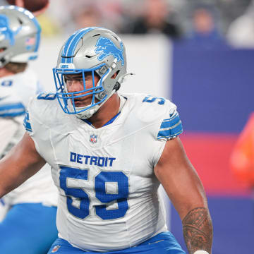 Detroit Lions offensive tackle Giovanni Manu (59).