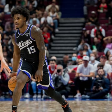 Oct 8, 2023; Vancouver, British Columbia, CAN; Toronto Raptors guard Malachi Flynn (22) guards Sacramento Kings guard Davion Mitchell (15) as he dribbles the ball in the first half at Rogers Arena. Mandatory Credit: Bob Frid-USA TODAY Sports