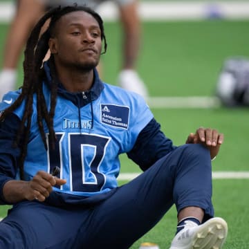 Wide receiver DeAndre Hopkins (10) warms up during the Tennessee Titans mandatory mini-camp at Ascension Saint Thomas Sports Park in Nashville, Tenn., Tuesday, June 4, 2024.