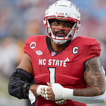 Sep 7, 2024; Charlotte, North Carolina, USA; North Carolina State Wolfpack defensive end Davin Vann (1) during pregame activities against the Tennessee Volunteers at the Dukes Mayo Classic at Bank of America Stadium. Mandatory Credit: Jim Dedmon-Imagn Images