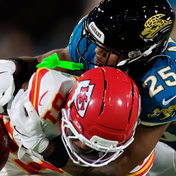 Jacksonville Jaguars safety Rayuan Lane III (25) tackles Kansas City Chiefs wide receiver Nikko Remigio (81) on a punt return during the first quarter of an NFL football matchup at EverBank Stadium, Monday, Oct. 6, 2025, in Jacksonville, Fla. The Jacksonville Jaguars edged the Kansas City Chiefs 31-28. [Corey Perrine/Florida Times-Union]