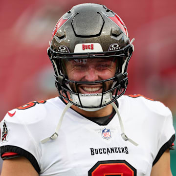 Aug 23, 2024; Tampa, Florida, USA;  Tampa Bay Buccaneers quarterback Baker Mayfield (6) warms up before a preseason game against the Miami Dolphins at Raymond James Stadium. Mandatory Credit: Nathan Ray Seebeck-Imagn Images