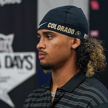 Jul 9, 2025; Frisco, TX, USA; Colorado quarterback Julian Lewis speaks with the media during 2025 Big 12 Football Media Days at The Star. Mandatory Credit: Raymond Carlin III-Imagn Images
