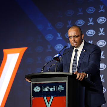 Jul 22, 2025; Charlotte, NC, USA; Virginia head coach Tony Elliott answers questions from the media during ACC Media Days at Hilton Charlotte Uptown. Mandatory Credit: Jim Dedmon-Imagn Images