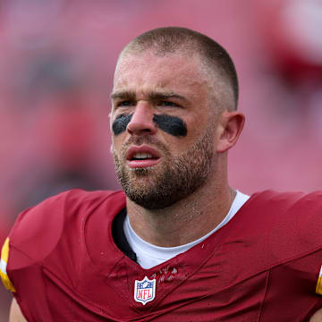 Sep 8, 2024; Tampa, Florida, USA; Washington Commanders tight end Zach Ertz (86) warms up before a game against the Tampa Bay Buccaneers at Raymond James Stadium. Mandatory Credit: Nathan Ray Seebeck-Imagn Images