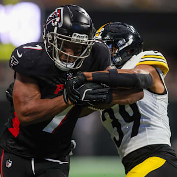 Sep 8, 2024; Atlanta, Georgia, USA; Atlanta Falcons running back Bijan Robinson (7) is tackled by Pittsburgh Steelers safety Minkah Fitzpatrick (39) in the second quarter at Mercedes-Benz Stadium. Mandatory Credit: Brett Davis-Imagn Images