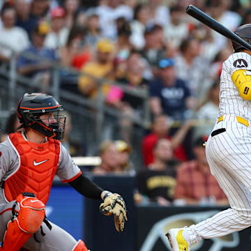 Sep 7, 2024; San Diego, California, USA; San Diego Padres designated hitter Luis Arraez (4) singles during the third inning against the San Francisco Giants at Petco Park.