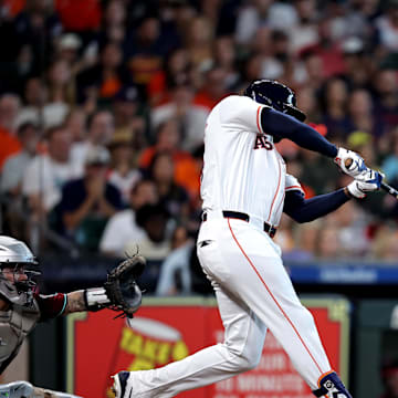 Sep 7, 2024; Houston, Texas, USA; Houston Astros designated hitter Yordan Alvarez (44) hits an RBI single against the Arizona Diamondbacks during the fourth inning at Minute Maid Park.