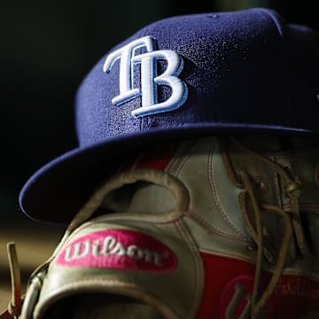 Apr 3, 2023; Washington, District of Columbia, USA; A general view of a Tampa Bay Rays hat and glove during the seventh inning of the game against the Washington Nationals at Nationals Park. Mandatory Credit: Scott Taetsch-Imagn Images