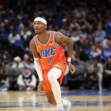Dec 19, 2024; Orlando, Florida, USA; Oklahoma City Thunder guard Shai Gilgeous-Alexander (2) reacts after a shot against the Orlando Magic in the third quarter at Kia Center. Mandatory Credit: Nathan Ray Seebeck-Imagn Images