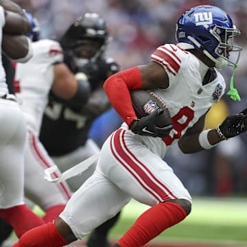 Aug 17, 2024; Houston, Texas, USA; New York Giants wide receiver Malik Nabers (9) runs with the ball during the game against the Houston Texans at NRG Stadium.  