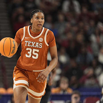 March 9, 2025; Greenville, SC, USA; Texas Longhorns forward Madison Booker (35) brings the ball up court against South Carolina Gamecocks during the first half at Bon Secours Wellness Arena. Mandatory Credit: Jim Dedmon-Imagn Images