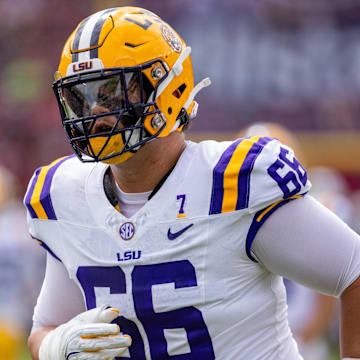 LSU Tigers offensive tackle Will Campbell (66) warms up before a game against the South Carolina Gamecocks.