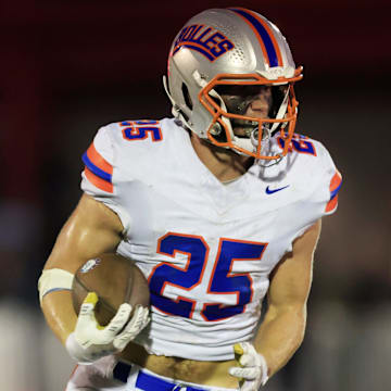 Bolles' Xander Edwards (25) rushed for over 500 yards and eight touchdowns in the Bulldogs' 73-49 win over the Baldwin Indians. His eight touchdowns broke Derrick Henry's single-game rushing touchdown record when the NFL superstar was enrolled at Yulee. 