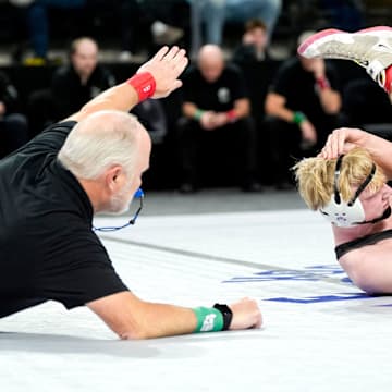 Bettendorf’s Lincoln Jipp pins Linn-Mar’s Philip Jacobs in the 175-pound championship during the Dan Gable Donnybrook wrestling tournament finals Saturday, Dec. 7, 2024 at Xtream Arena in Coralville, Iowa.