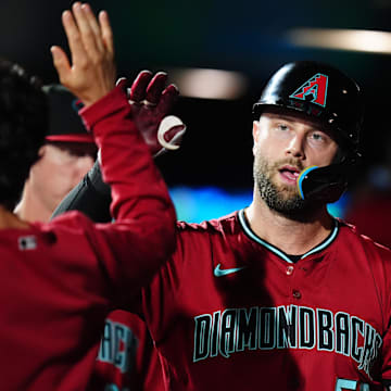 Sep 17, 2024; Denver, Colorado, USA; Arizona Diamondbacks first base Christian Walker (53) celebrates his solo home run in the eighth inning against the Colorado Rockies at Coors Field. Mandatory Credit: Ron Chenoy-Imagn Images