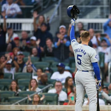 Sep 13, 2024; Atlanta, Georgia, USA; Los Angeles Dodgers first baseman Freddie Freeman (5) acknowledges the crowd before an at bat against the Atlanta Braves in the first inning at Truist Park. Mandatory Credit: Brett Davis-Imagn Images