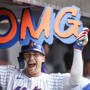 Jun 30, 2024; New York City, New York, USA;  New York Mets center fielder Brandon Nimmo (9) celebrates in the dugout after hitting a two run home run to tie the game in the seventh inning against the Houston Astros at Citi Field. Mandatory Credit: Wendell Cruz-USA TODAY Sports