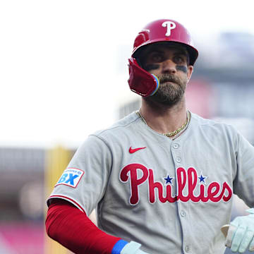 May 21, 2025; Denver, Colorado, USA; Philadelphia Phillies first base Bryce Harper (3) on deck in the first inning against the Colorado Rockies at Coors Field. Mandatory Credit: Ron Chenoy-Imagn Images