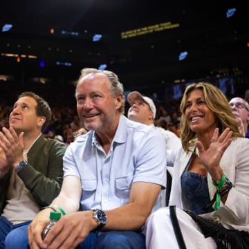 Jun 30, 2024; Phoenix, Arizona, USA; (From left) Phoenix Suns guard Devon Booker with Phoenix Mercury owner Mat Ishbia and Suns head coach Mike Budenholzer during the game between the Indiana Fever and the Phoenix Mercury at Footprint Center. Mandatory Credit: Mark J. Rebilas-USA TODAY Sports