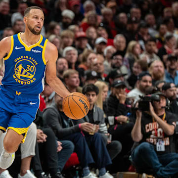 Oct 23, 2024; Portland, Oregon, USA;  Golden State Warriors point guard Stephen Curry (30) dribbles the ball during the second half against the Portland Trailblazers at Moda Center. Mandatory Credit: Stephen Brashear-Imagn Images
