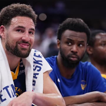 Apr 16, 2024; Sacramento, California, USA; Golden State Warriors guard Klay Thompson (11) sits on the bench during action against the Sacramento Kings in the fourth quarter during a play-in game of the 2024 NBA playoffs at the Golden 1 Center. Mandatory Credit: Cary Edmondson-Imagn Images