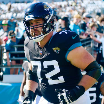 Jacksonville Jaguars offensive tackle Walker Little (72) runs on the field before an NFL football matchup Sunday, Nov. 19, 2023 at EverBank Stadium in Jacksonville, Fla. The Jacksonville Jaguars defeated the Tennessee Titans 34-14. [Corey Perrine/Florida Times-Union]