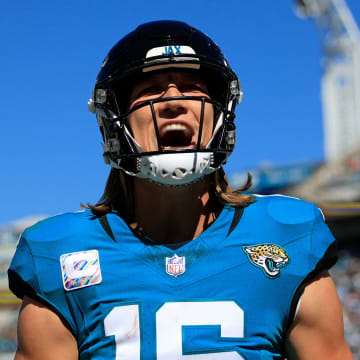 Jacksonville Jaguars quarterback Trevor Lawrence (16) yells after wide receiver Christian Kirk (13), not shown, caught a pass for a touchdown score during the second quarter of an NFL football matchup Sunday, Oct. 15, 2023 at EverBank Stadium in Jacksonville, Fla. The Jacksonville Jaguars defeated the Indianapolis Colts 37-20.