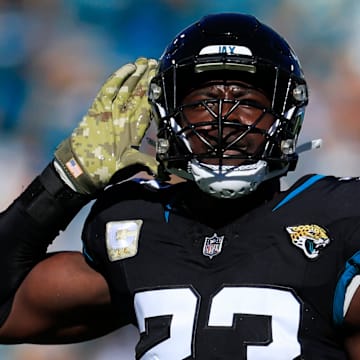 Jacksonville Jaguars linebacker Foyesade Oluokun (23) motions to the crowd after a sack on Tennessee Titans quarterback Will Levis (8), not shown, during the first quarter an NFL football matchup Sunday, Nov. 19, 2023 at EverBank Stadium in Jacksonville, Fla. The Jacksonville Jaguars defeated the Tennessee Titans 34-14. [Corey Perrine/Florida Times-Union]