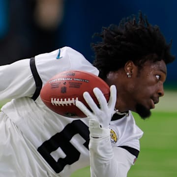 Jacksonville Jaguars safety Darnell Savage (6) falls to the turf after hauling in a reception during the second day of a mandatory minicamp Tuesday, June 11, 2024, at EverBank Stadium's Miller Electric Center in Jacksonville, Fla.