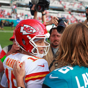 Kansas City Chiefs quarterback Patrick Mahomes (15) says goodbye to Jacksonville Jaguars quarterback Trevor Lawrence (16) after a NFL football game Sunday, Sept. 17, 2023 at EverBank Stadium in Jacksonville, Fla. The Kansas City Chiefs defeated the Jacksonville Jaguars 17-9. [Corey Perrine/Florida Times-Union]