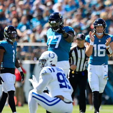 Jacksonville Jaguars quarterback Trevor Lawrence (16) reacts to a false start by Indianapolis Colts defensive tackle DeForest Buckner (99) during the first quarter of an NFL football matchup Sunday, Oct. 15, 2023 at EverBank Stadium in Jacksonville, Fla. The Jacksonville Jaguars defeated the Indianapolis Colts 37-20. [Corey Perrine/Florida Times-Union]